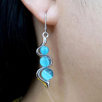 Fashionable Blue Cat's Eye Stone Wavy Earrings 21797561C